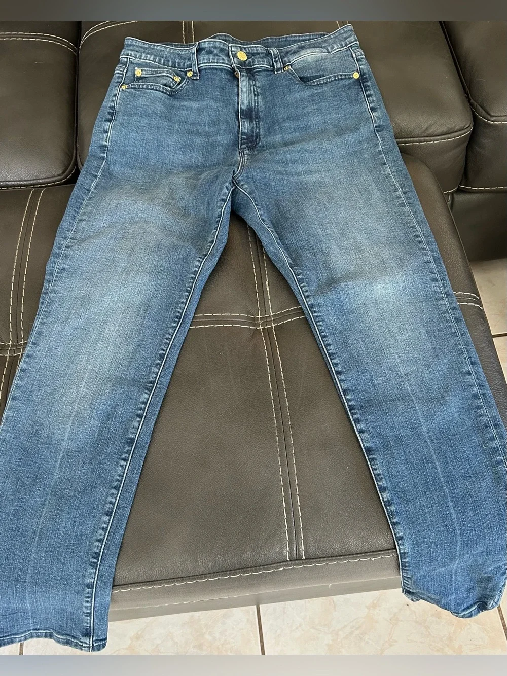 Michael Kors Medium Wash Slim Leg Jeans with Gold MK Logo